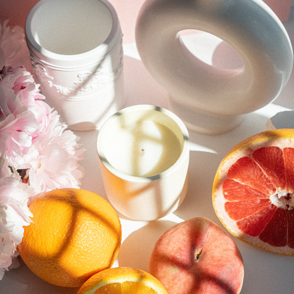 Clean burning soy wax candle with citrus aroma in elegant jar