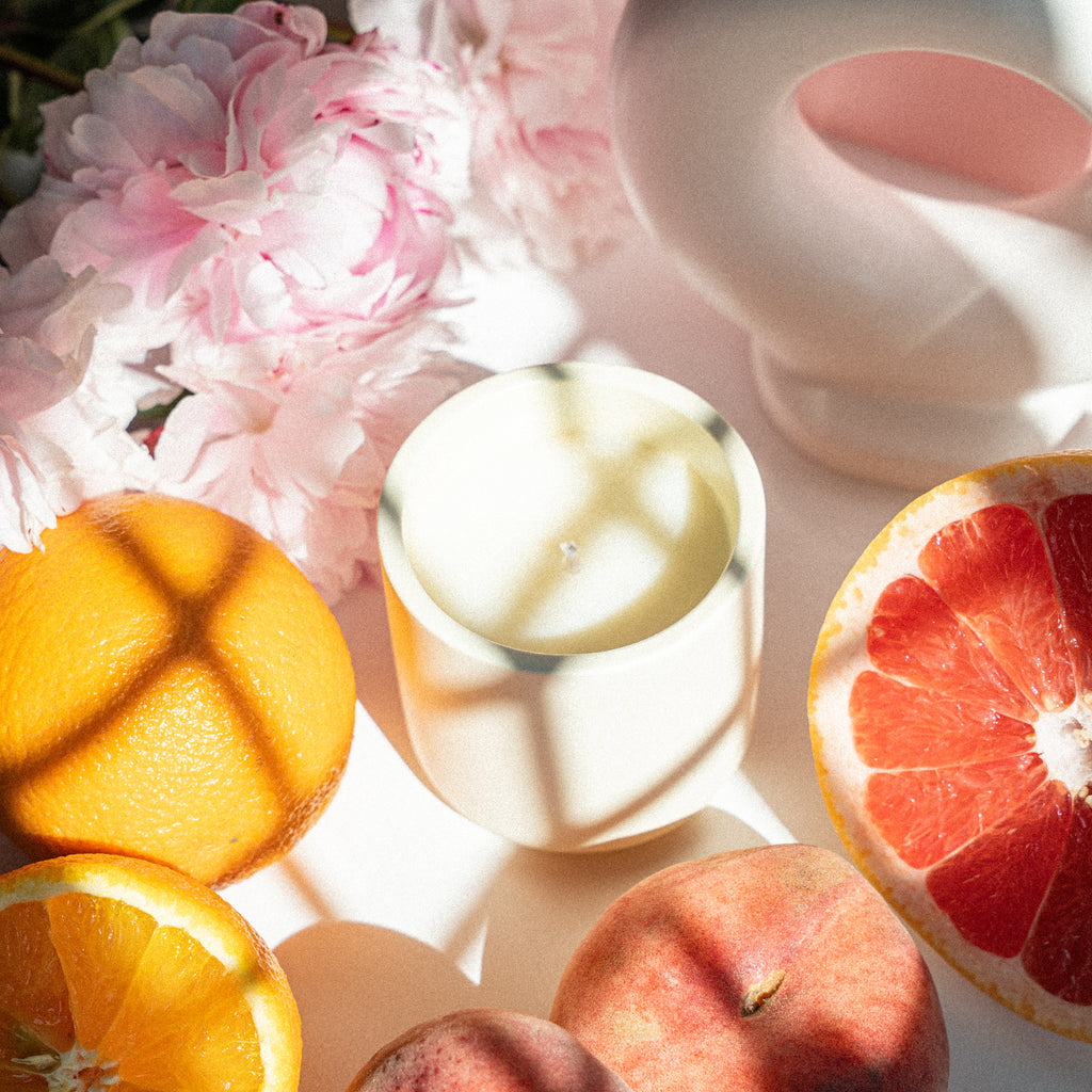 Hand-poured grapefruit and mangosteen scented soy wax candle